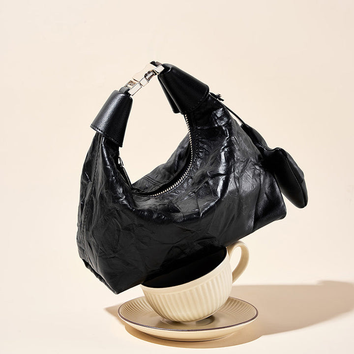 Avellie Noir Crinkle Mini Bag | Modern design with bow details