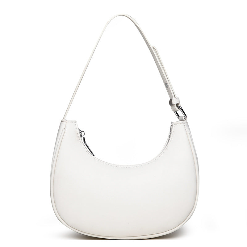 Avellie Half-moon shaped leather bag | Modern design with adjustable shoulder strap