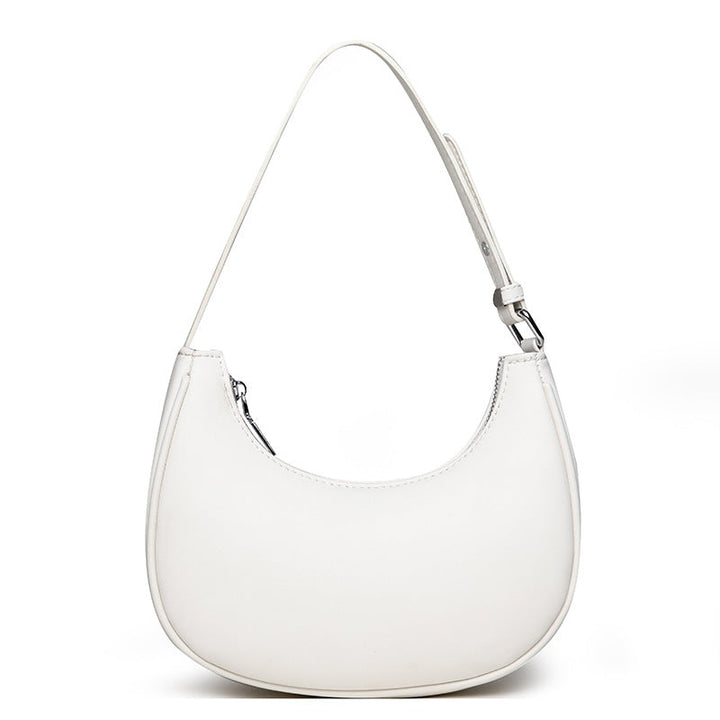 Avellie Half-moon shaped leather bag | Modern design with adjustable shoulder strap