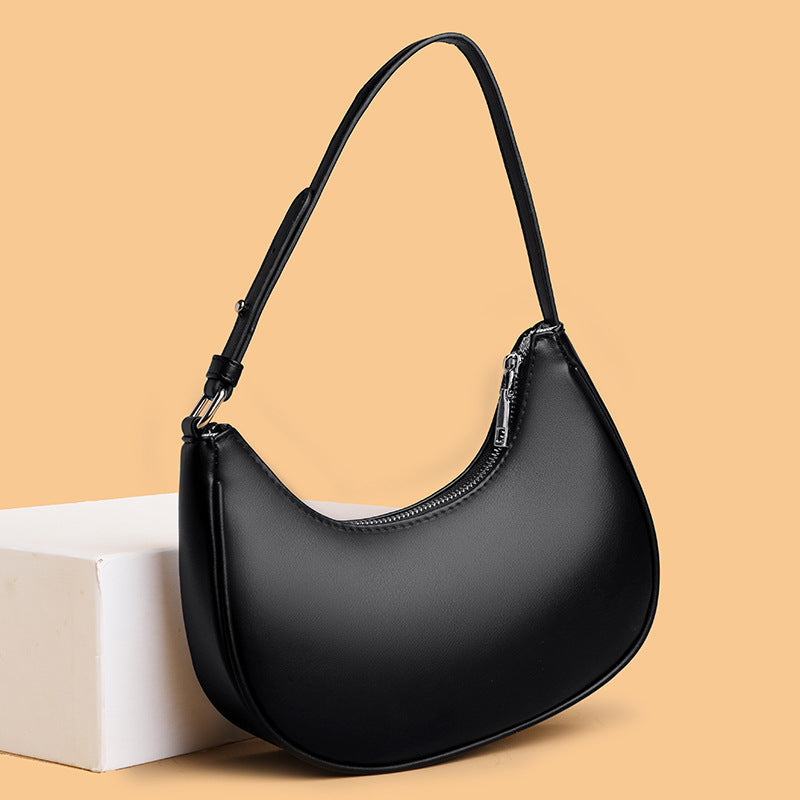 Avellie Half-moon shaped leather bag | Modern design with adjustable shoulder strap