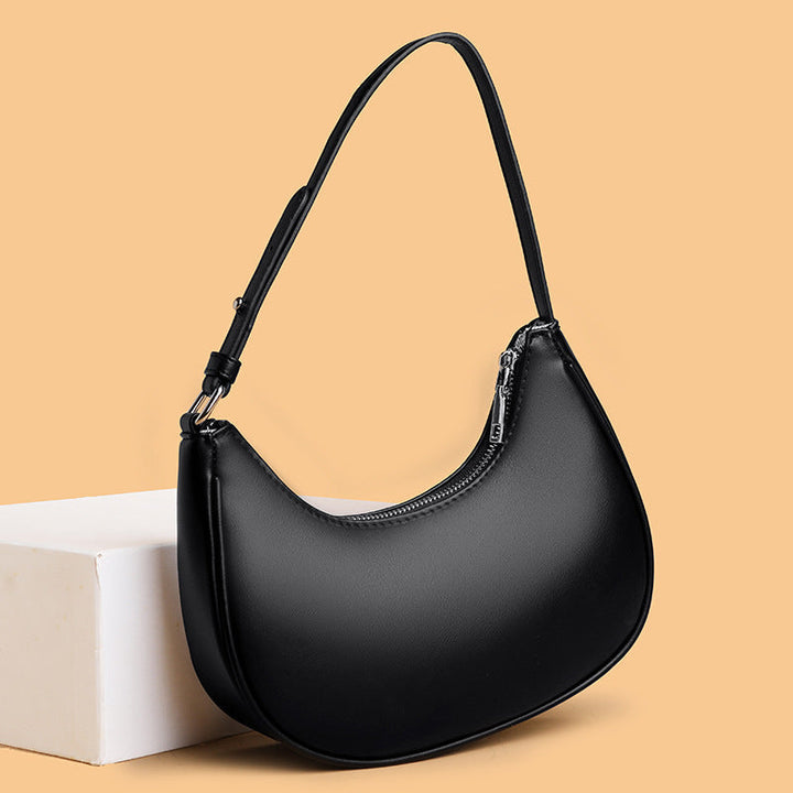 Avellie Half-moon shaped leather bag | Modern design with adjustable shoulder strap