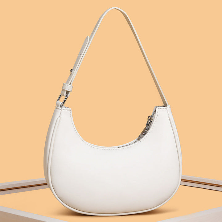 Avellie Half-moon shaped leather bag | Modern design with adjustable shoulder strap