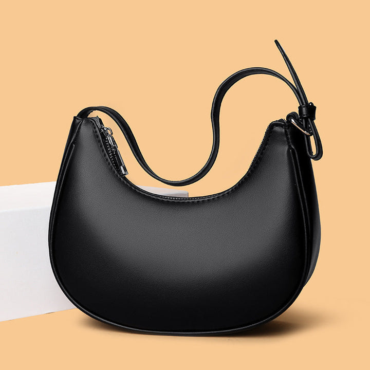 Avellie Half-moon shaped leather bag | Modern design with adjustable shoulder strap